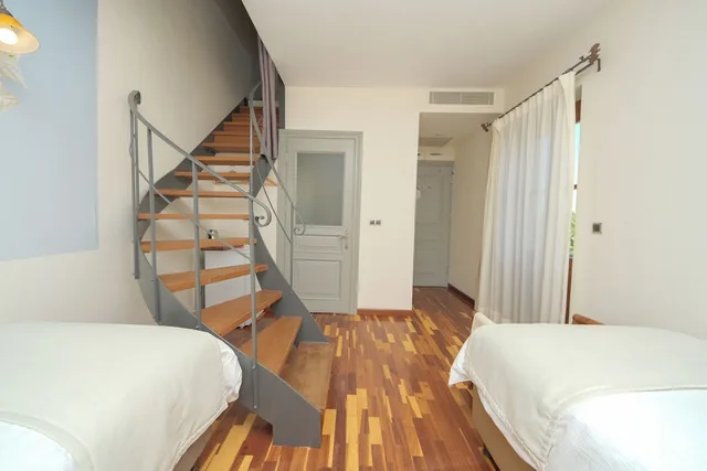 غرفة عائلية رباعية بسرير مزدوج وسريرين منفصلين بشرفة بغرفتي نوم، Cunda Labris Hotel 4/5