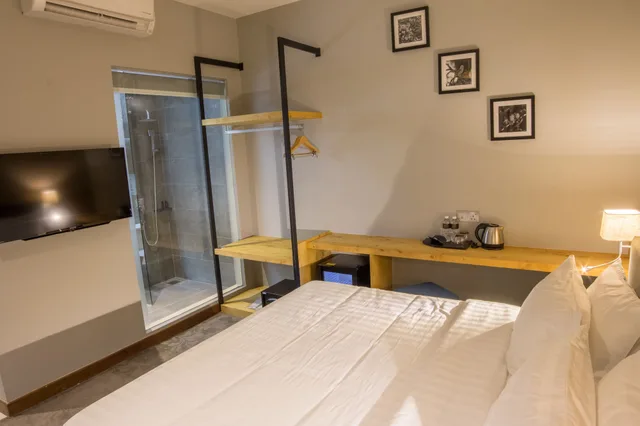 غرفة ديلوكس بسرير كينج، Redpine Boutique Hotel 2/4