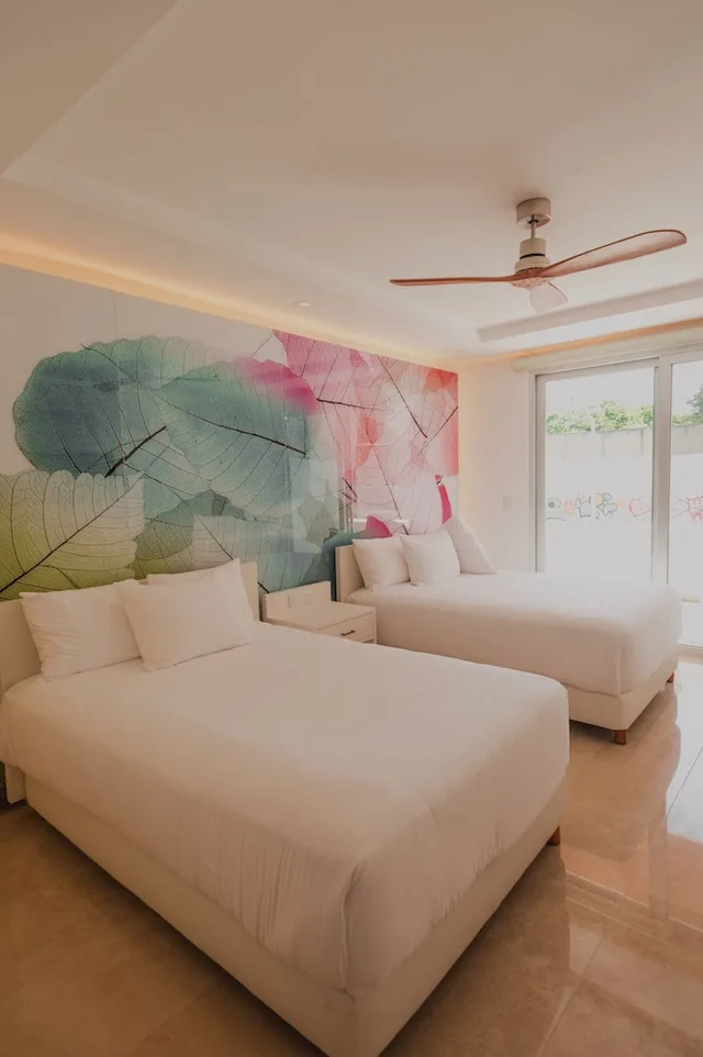 غرفة ديلوكس رباعية بسريرين مزدوجين بشرفة، Antera Hotel and Residences 1/2
