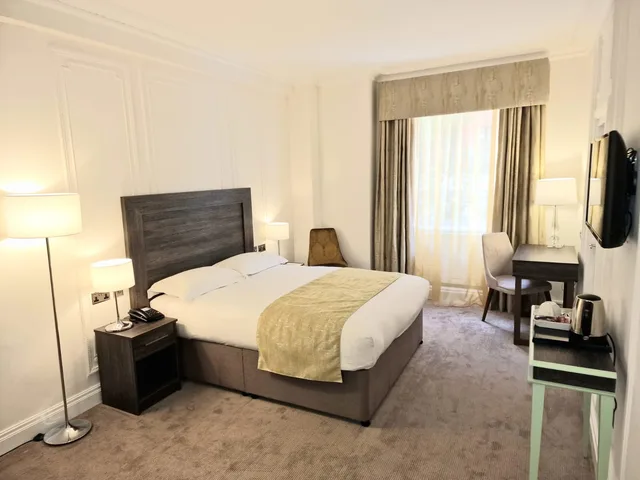 غرفة قياسية بسرير مزدوج أو سريرين منفصلين، Astor Court Hotel 3/4