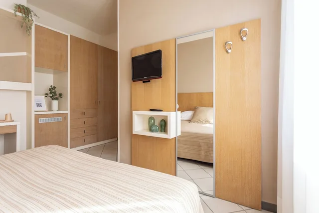 غرفة قياسية رباعية بسريرين منفصلين وسرير بطابقين، Hotel La Tavernetta 1/10