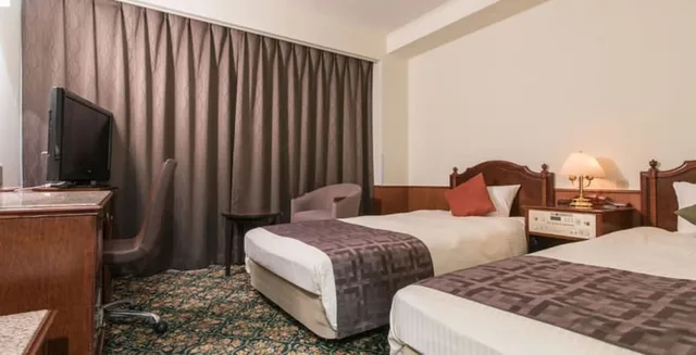 غرفة مفردة بسريرين منفصلين، Premier Hotel Cabin Obihiro 2/4