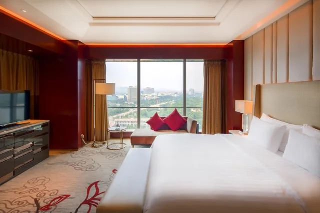 غرفة ديلوكس بسرير كينج وسرير كوين، SANDING NEW CENTURY GRAND HOTEL YIWU 1/2