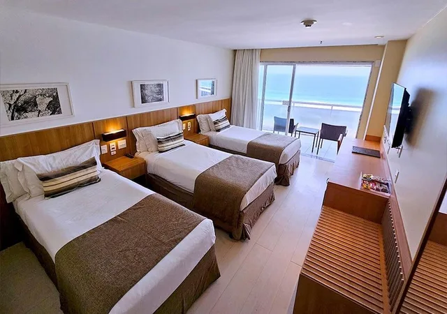 غرفة ديلوكس ثلاثية بإطلالة على البحر بشرفة، Riale Brisa Barra Hotel 1/1