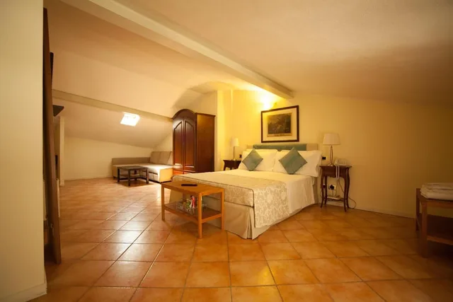 غرفة أساسية رباعية بسرير مزدوج مع أريكة، Albergo Orologio 1/3