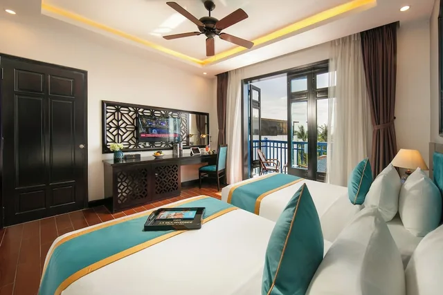 غرفة ديلوكس بسرير كينج بشرفة، Silk River Hoi An Hotel & Spa 3/4