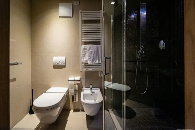 غرفة ديلوكس بسرير كوين وسرير فردي، Boutique Exclusive B&B Trento 7/10