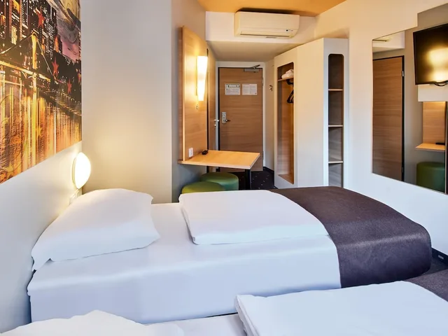 غرفة بسريرين منفصلين، B&B Hotel Frankfurt City-Ost 1/5