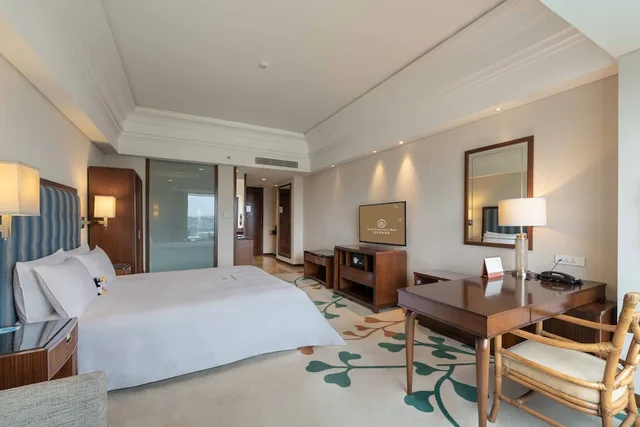 غرفة ديلوكس بسرير كينج بإطلالة على النهر، Kande International Hotel Huizhou 3/7