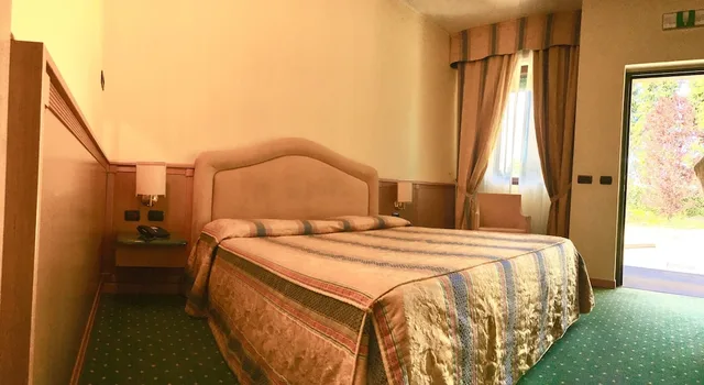 غرفة ثلاثية بسرير مزدوج وسرير فردي، Airport Motel Malpensa 3/5