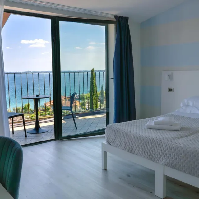 غرفة ديلوكس بسرير مزدوج أو سريرين منفصلين بإطلالة على البحيرة، AHG Riva del Sole Wellness Hotel 8/10