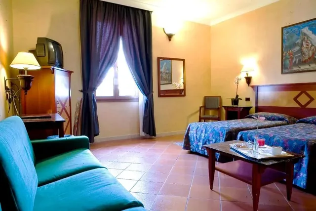 غرفة قياسية رباعية، Hotel Corona d'Italia 1/2