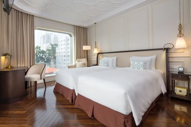 غرفة ديلوكس بسريرين منفصلين بإطلالة على المدينة، Hotel des Arts Saigon - MGallery Collection 3/7