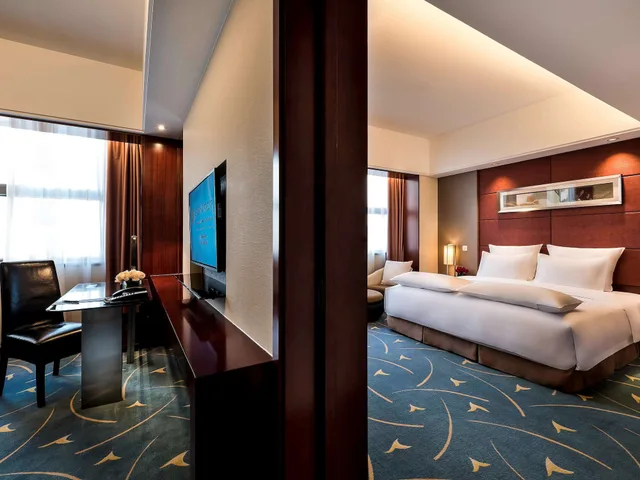 جناح حصري بسرير كينج بمنطقة جلوس مع دخول الصالة في طابق مرتفع، PULLMAN BEIJING SOUTH 4/10