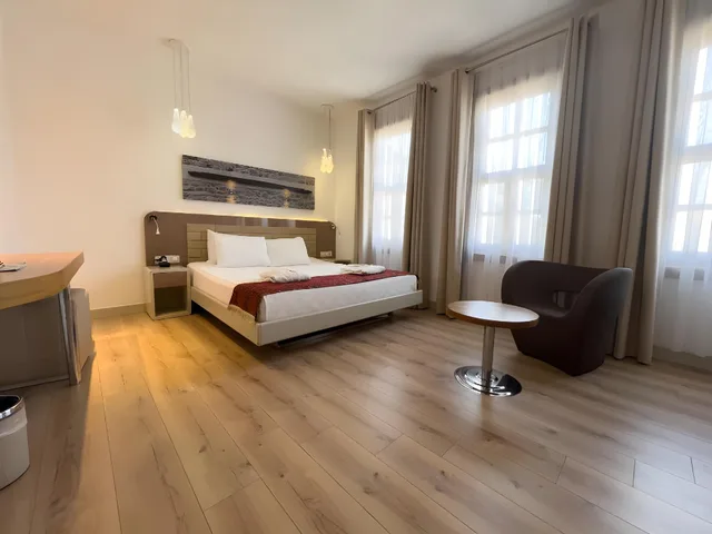 Deluxe, Single, 2 Double Beds، Puding Hotel 1/1