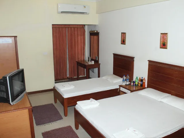غرفة تنفيذية ثلاثية بسرير كينج وسرير فردي، Hotel Chitra Park 2/2