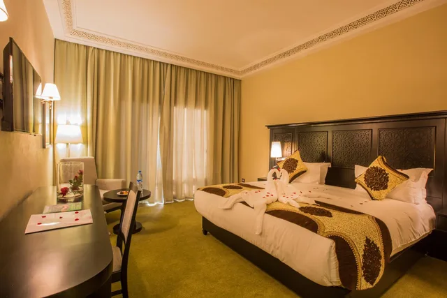غرفة بسرير مزدوج أو سريرين منفصلين بإطلالة على المسبح، Hotel Riad Ennakhil 6/10