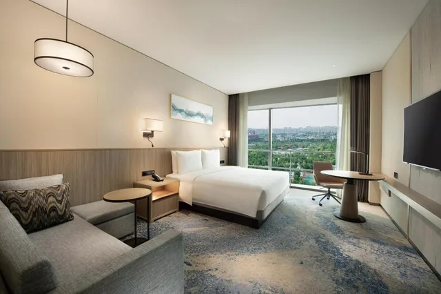 غرفة بسرير كينج بإطلالة على الحديقة مع أريكة، Hyatt Place Taiyuan Longcheng 1/1