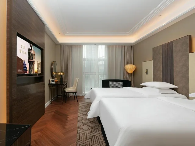 Elegant, Twin Beds، Metropolo Zhenjiang Railway Station Wanda Square 2/7