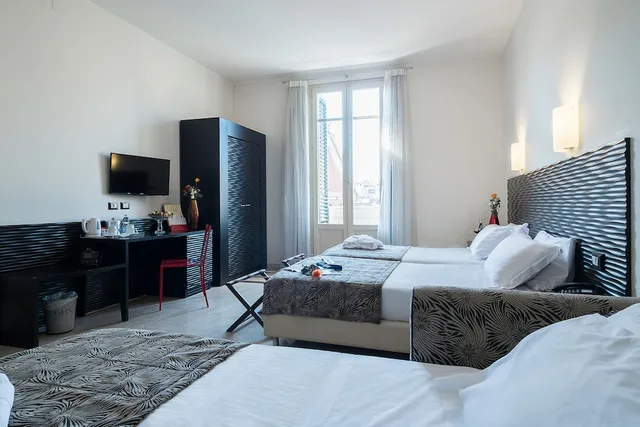 غرفة قياسية ثلاثية بسرير كينج، Hotel Garibaldi 2/3