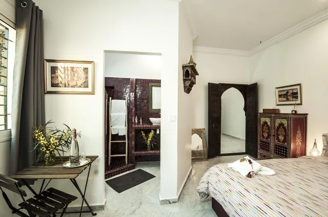 غرفة ديلوكس بسرير كوين، L'Hostel 1/1
