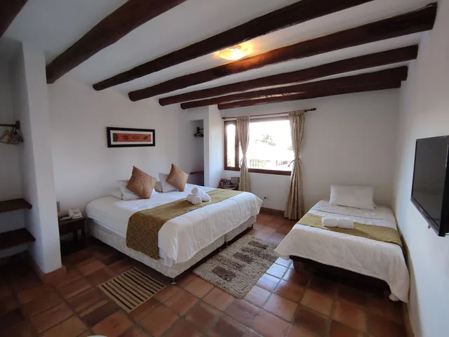 غرفة قياسية ثلاثية بسرير كينج وسرير فردي، Casa de Campo Hotel 1/5