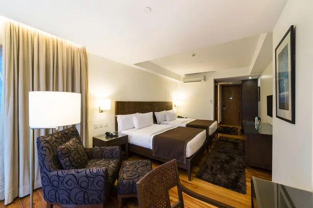 غرفة ديلوكس بسريرين كوين، City Garden Grand Hotel 5/10