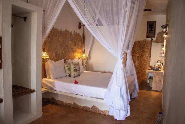 غرفة سوبيريور ثلاثية بسرير كينج وسرير فردي بإطلالة جزئية على البحر، Mvuvi Boutique Resort 2/6