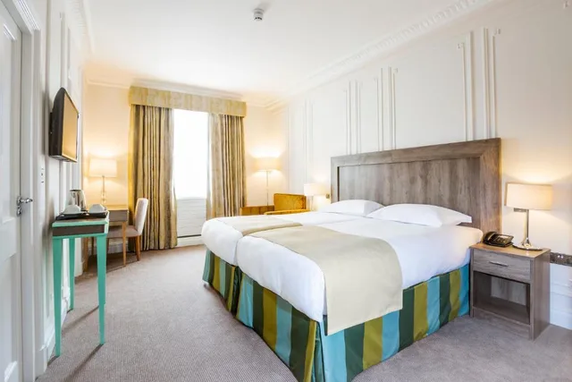 غرفة قياسية بسرير مزدوج أو سريرين منفصلين، Astor Court Hotel 2/4