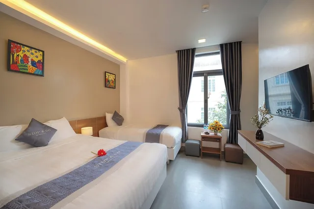 Mega, Triple, 1 Queen and 1 Single Bed، Stop And Go Boutique Homestay In Hue 1/7
