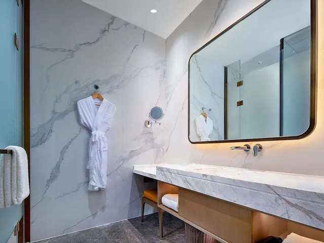غرفة ديلوكس بسرير كينج، Grand Mercure Chengdu East 5/7