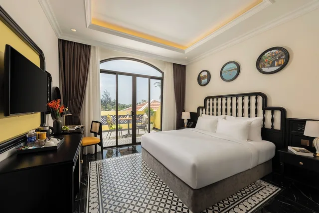 غرفة غراند بسرير كينج بإطلالة على المسبح بشرفة، Nesta Hoi An Resort and Spa 4/9