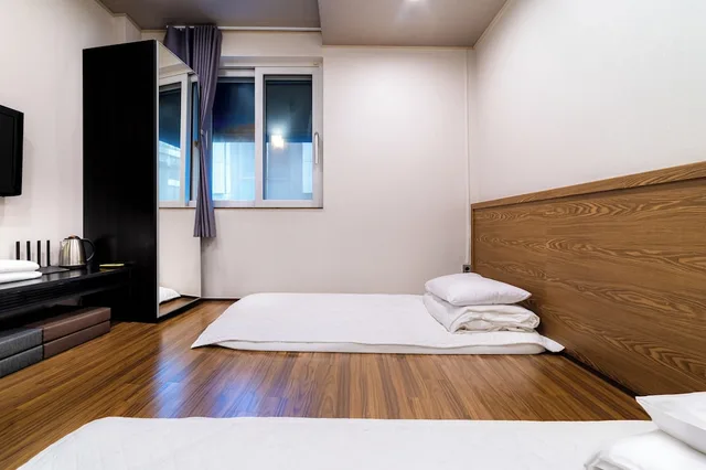 غرفة ديلوكس بفرشتي فوتون، Soo Song Guest House 1/10