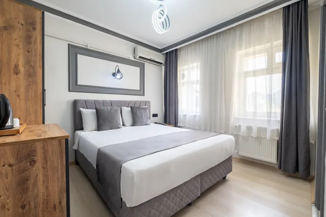غرفة اقتصادية مفردة بسرير كينج، Sur Hotel 1/1