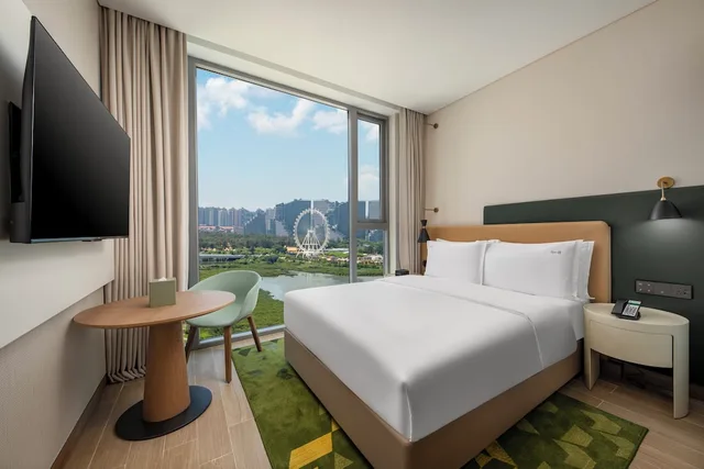 غرفة بريميوم بسرير كينج، Holiday Inn Beihai Silver Beach by IHG 5/6