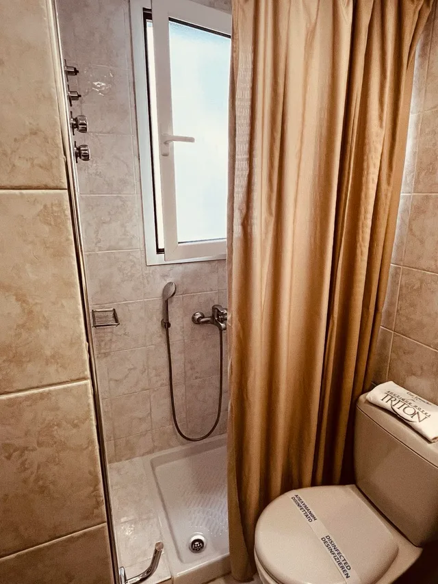 غرفة اقتصادية بسرير مزدوج أو سريرين منفصلين، Triton Hotel 4/4