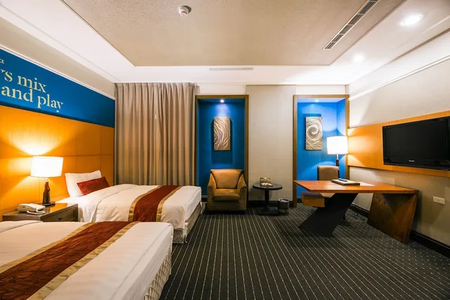 غرفة سوبيريور ثلاثية بسرير مزدوج وسرير فردي، Golden Tulip Aesthetics Hotel, Miaoli 4/10