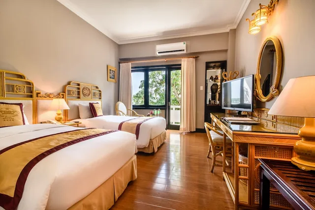 غرفة ديلوكس بسريرين منفصلين بإطلالة على الحديقة، Huong Giang Hotel 5/10