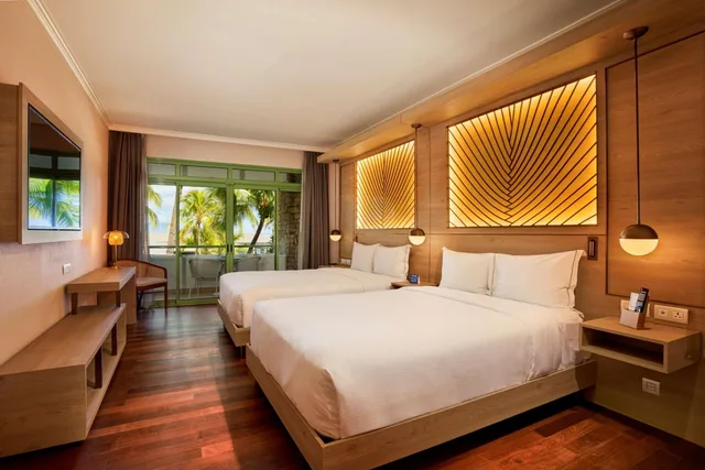 غرفة بسريرين كوين بإطلالة على البحر مع أريكة، Hilton Hotel Tahiti 3/4