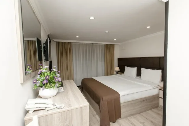 شقة بسرير كينج بإطلالة على الحديقة، DELUXE CITY HOTEL 6/9