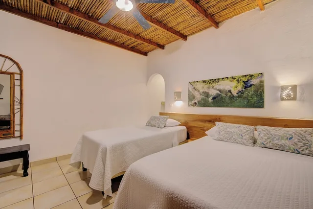 غرفة اقتصادية بسرير كوين وسرير فردي، Cariblue Beach Jungle Resort 4/10