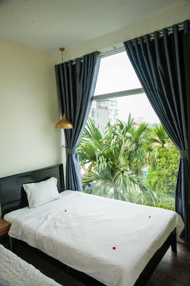 غرفة ثلاثية بسرير مزدوج وسرير فردي، Hue Four Seasons Hotel 1/1