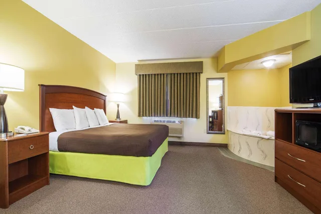 Suite, King Bed, AmericInn by Wyndham Sioux Falls 1/3