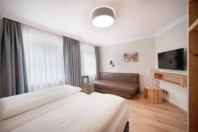 جناح عائلي بسرير مزدوج وسريرين منفصلين، Das Grune Hotel Zur Post - 100 Bio 10/10