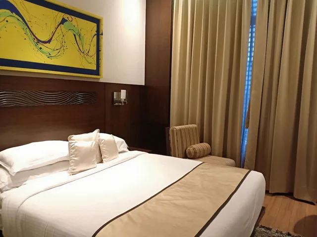 غرفة بسرير كوين، Monotel Luxury Business Hotel 1/4