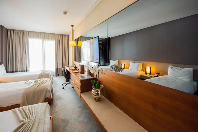 غرفة قياسية ثلاثية بثلاثة أسرّة، Dosso Dossi Hotels and SPA Downtown 3/7