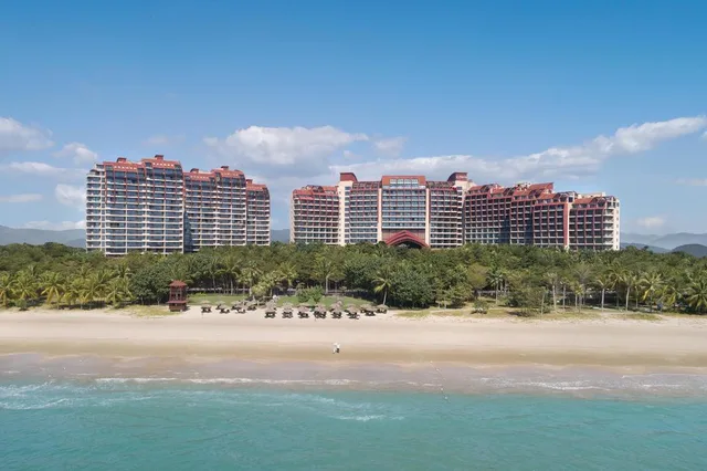 غرفة غراند تنفيذية بسريرين منفصلين بإطلالة على البحر مع دخول الصالة، Pullman Oceanview Sanya Bay Resort and Spa 1/1