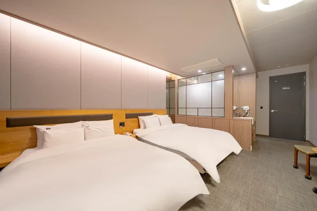 غرفة ملكية عائلية بسريرين منفصلين، Jinju Kai Hotel 1/2