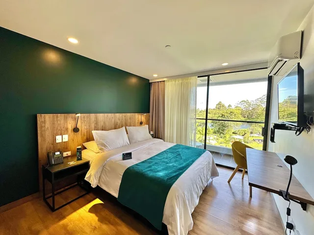 غرفة سوبيريور بسرير كوين بإطلالة على البحيرة، Hotel Lagoon Llanogrande 1/3