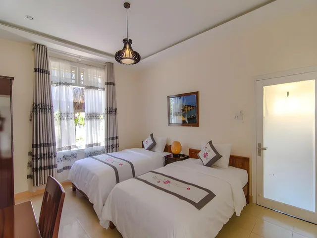 غرفة ديلوكس بسريرين منفصلين بإطلالة على النهر بشرفة، The Moon River Homestay Villa 1/1